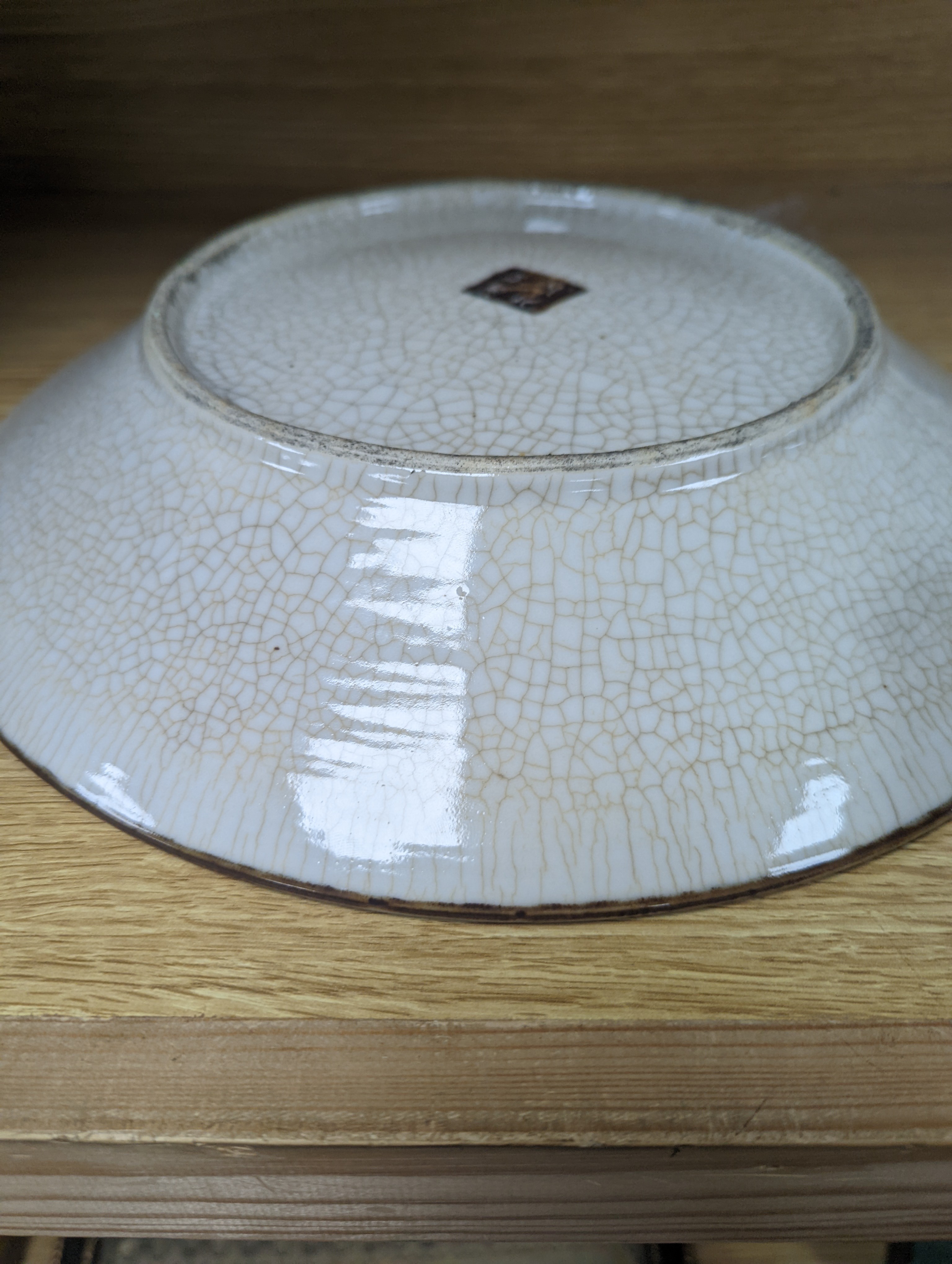 A Chinese famille verte 'warriors' crackle glaze dish 33cm